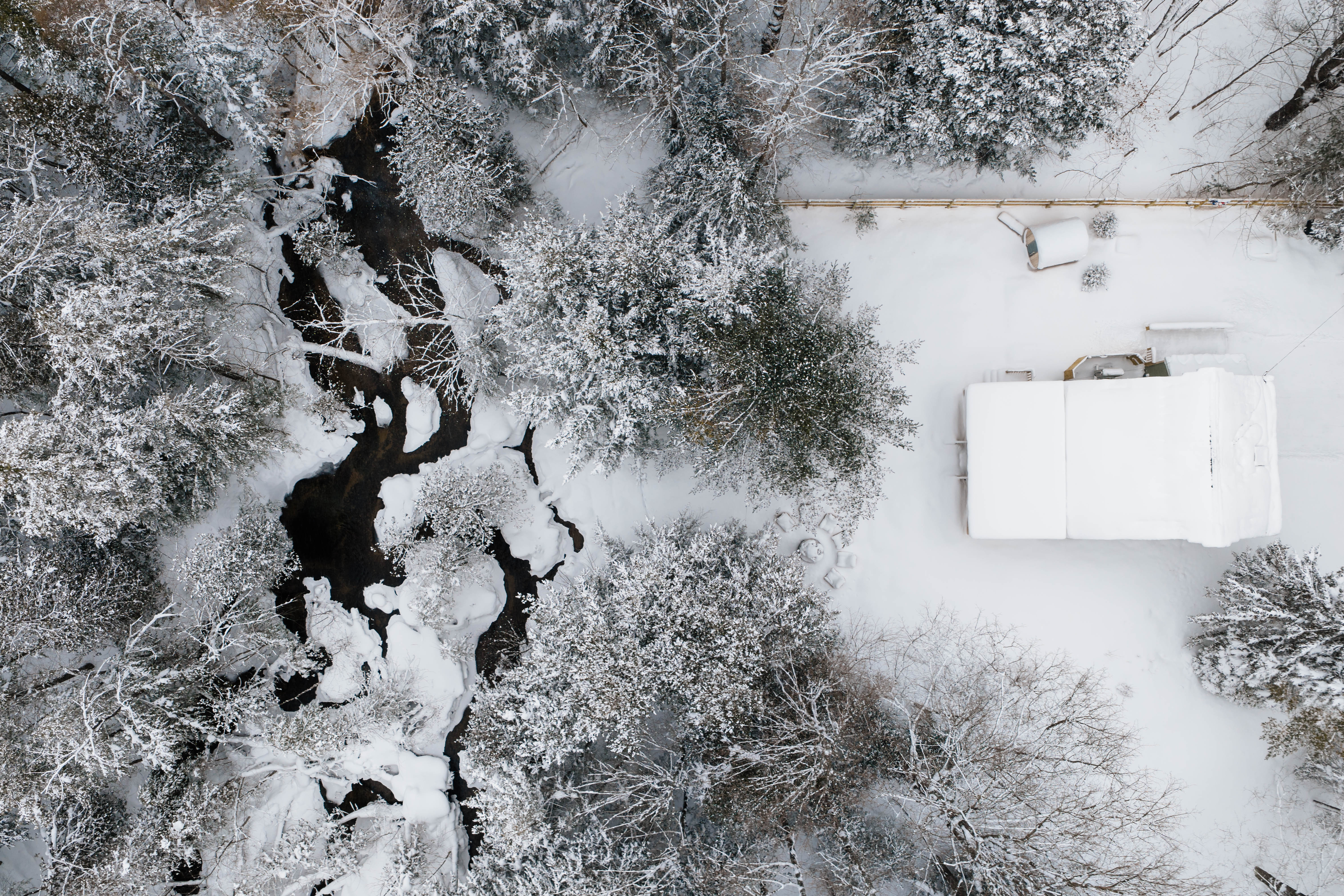 Streamside — aerial view of stream in winter